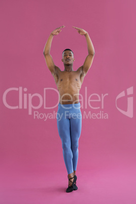 Portrait of ballerino practising ballet dance