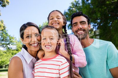 Portrait of happy family in park