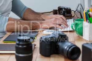 Photographers working at desk