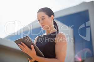 Businesswoman using digital tablet