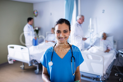 Portrait of female doctor smiling in the ward