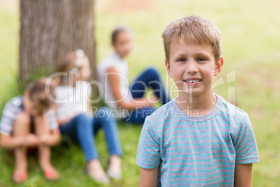 Boy smiling in park