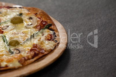 Delicious italian pizza served on wooden board