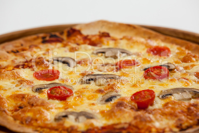 Delicious italian pizza served on pizza tray