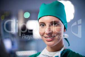 Portrait of female surgeon smiling in a operating room