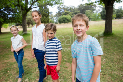 Kids standing together in park