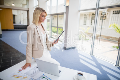 Businesswoman using digital tablet