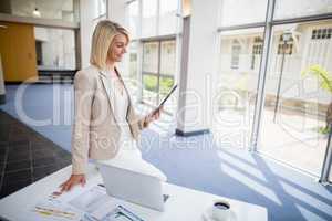 Businesswoman using digital tablet