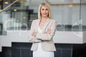 Beautiful businesswoman standing in conference centre