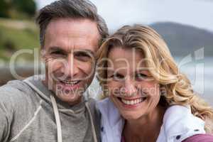 Portrait of mature couple on the beach