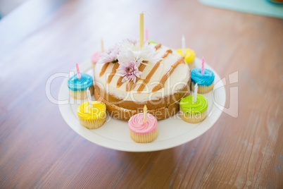 Close-up of a decorated birthday cake on a cake stand