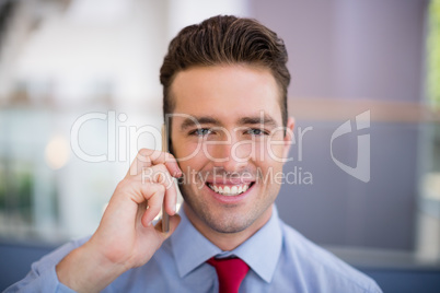 Businessman talking on mobile phone