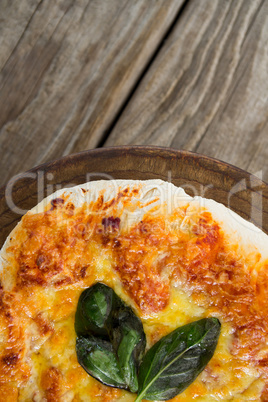 Italian pizza served in a pizza tray