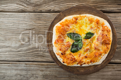 Italian pizza served in a pizza tray