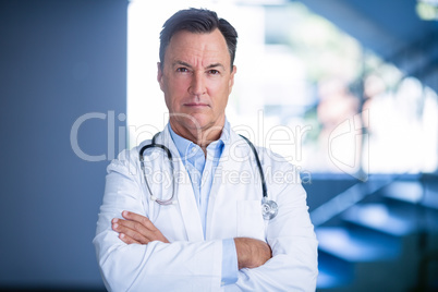 Portrait of doctors standing with arms crossed