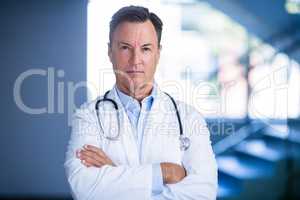 Portrait of doctors standing with arms crossed