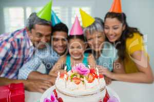 Happy multigeneration family celebrating birthday party
