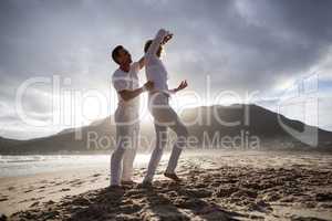 Mature couple having fun together at beach