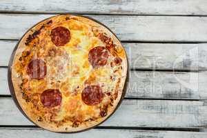 Italian pizza served on a pizza tray