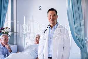 Portrait of male doctor smiling in the ward