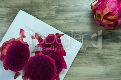 fresh dragon fruit, closeup on the plate