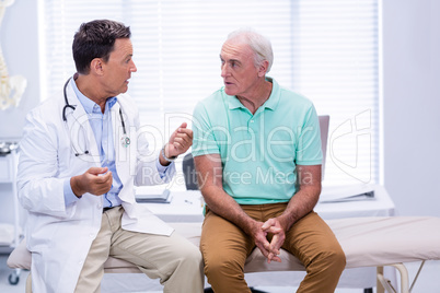 Doctor interacting with senior patient