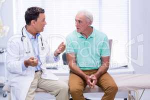 Doctor interacting with senior patient