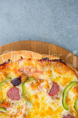 Close-up of pizza served on a pizza tray