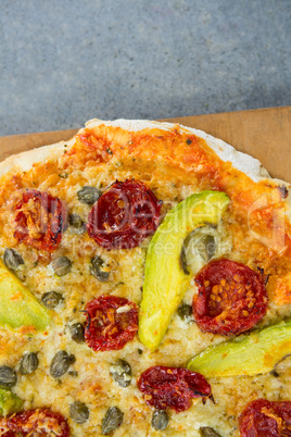 Close-up of pizza served on a pizza tray