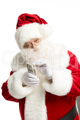 Santa Claus counting dollar banknotes