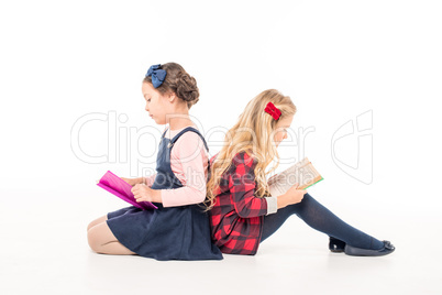 Schoolgirls reading books