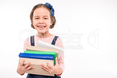 Schoolgirl holding books