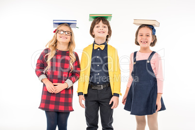 Schoolchildren standing with books