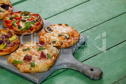 Various delicious italian pizza served on pizza tray