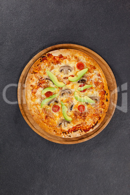 Delicious italian pizza served on pizza tray