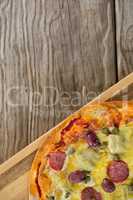 Italian pizza served in a chopping board