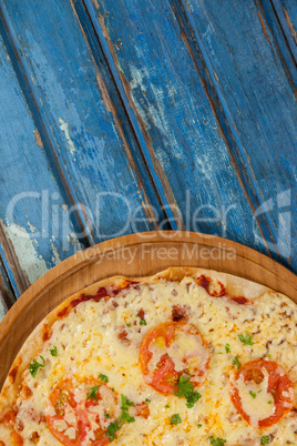 Delicious italian pizza served on pizza tray