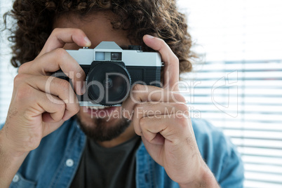 Male photographer with old fashioned camera