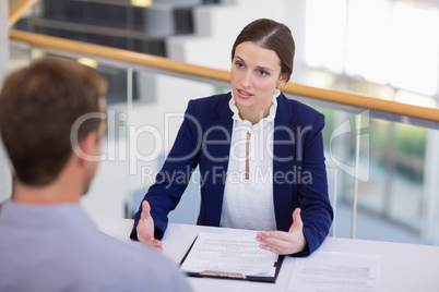 Business executives having a discussion at desk