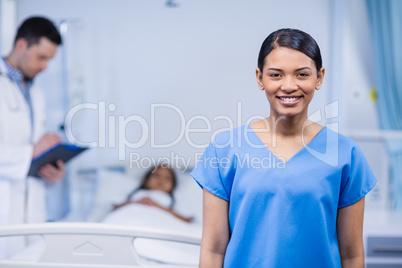 Portrait of nurse in hospital room