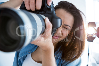 Female photographer with digital camera