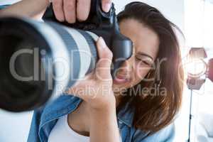 Female photographer with digital camera