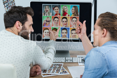 Photographers working at desk