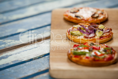 Various delicious italian pizza served on pizza tray