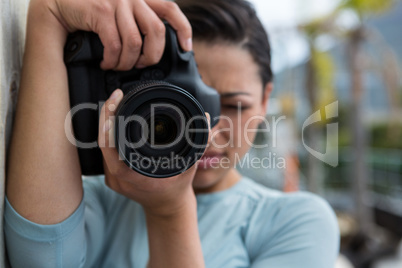 Female photographer with digital camera