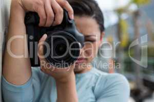 Female photographer with digital camera