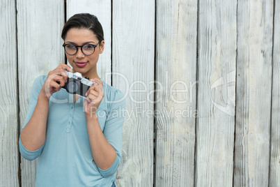 Female photographer with old fashioned camera