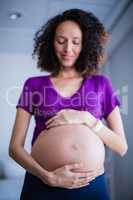Pregnant woman standing in ward