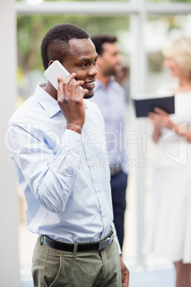 Businessman talking on mobile phone