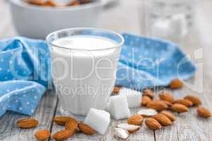 Fresh almond milk and nuts, vegan drink